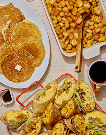 breakfast-catering-breakfast-burritos-breakfast-wraps-coffee-buttermilk-pancakes-potatoes Breakfast catering with breakfast burritos, breakfast wraps, coffee, buttermilk pancakes, and breakfast potatoes