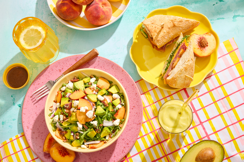 Rachel's Kitchen Summer Menu 2026 features Summer Peach Salad, Peach & Prosciutto Sandwich, Peachy Green Smoothie and Peach Lemonade